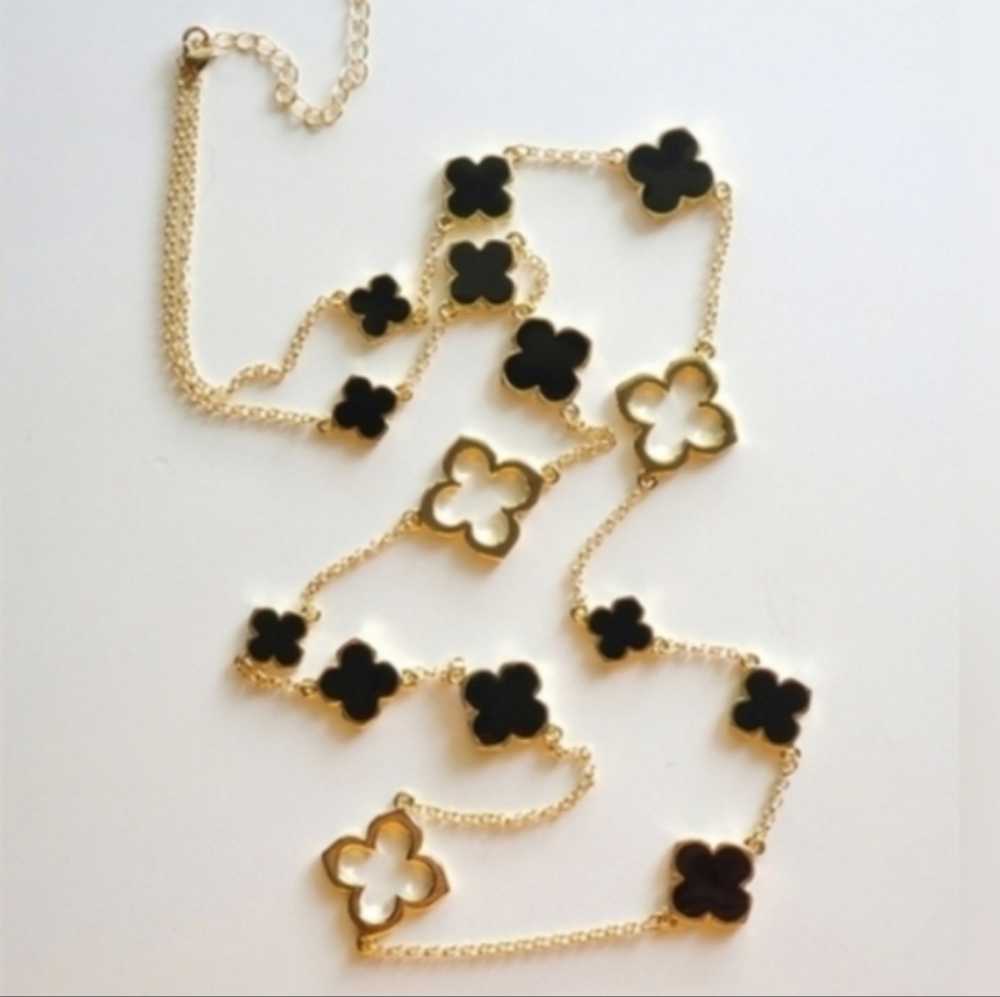 Stylish Black Quatrefoil Clover Necklace with Gold Cutouts - 40 Inches